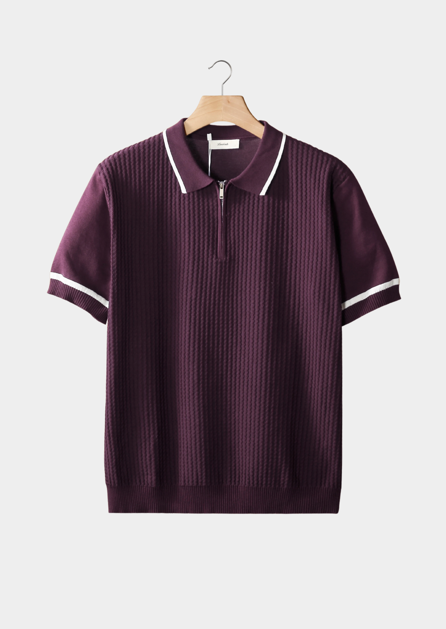 Polo violet avec fermeture éclair et bordure contrastante