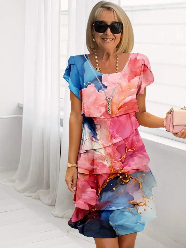 Adèle – Robe fluide et élégante à volants