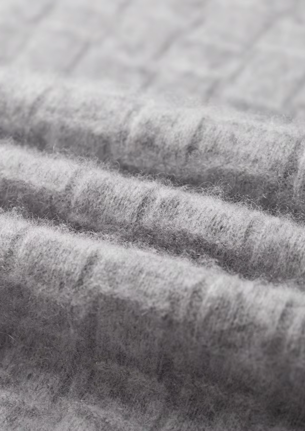 Col montant en laine mérinos extra-fine pure avec texture