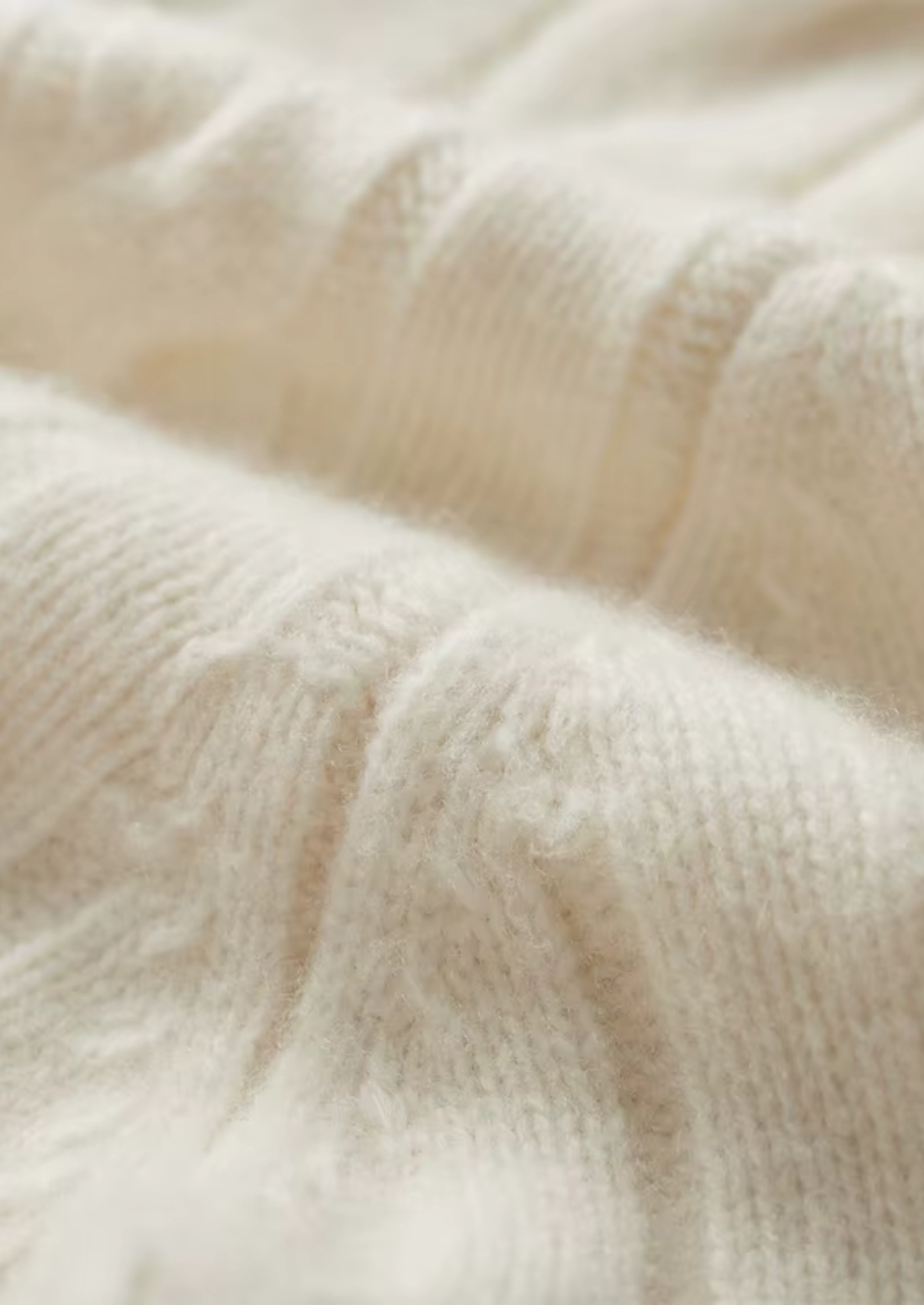 Cardigan en laine mérinos extra-fine pure avec design à double fermeture éclair et torsades