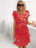 Geneviève – Robe fluide à volants élégante