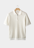 Polo zippé blanc à texture géométrique