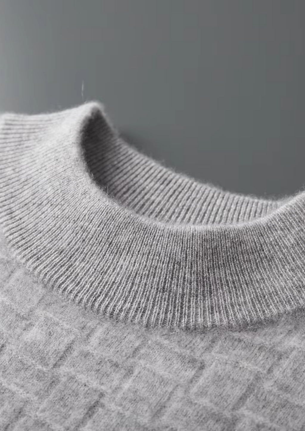 Col montant en laine mérinos extra-fine pure avec texture