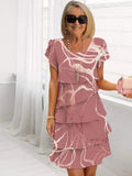 Chantal – Robe fluide élégante à volants