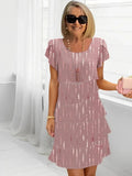 Isabelle – Robe fluide élégante avec volants