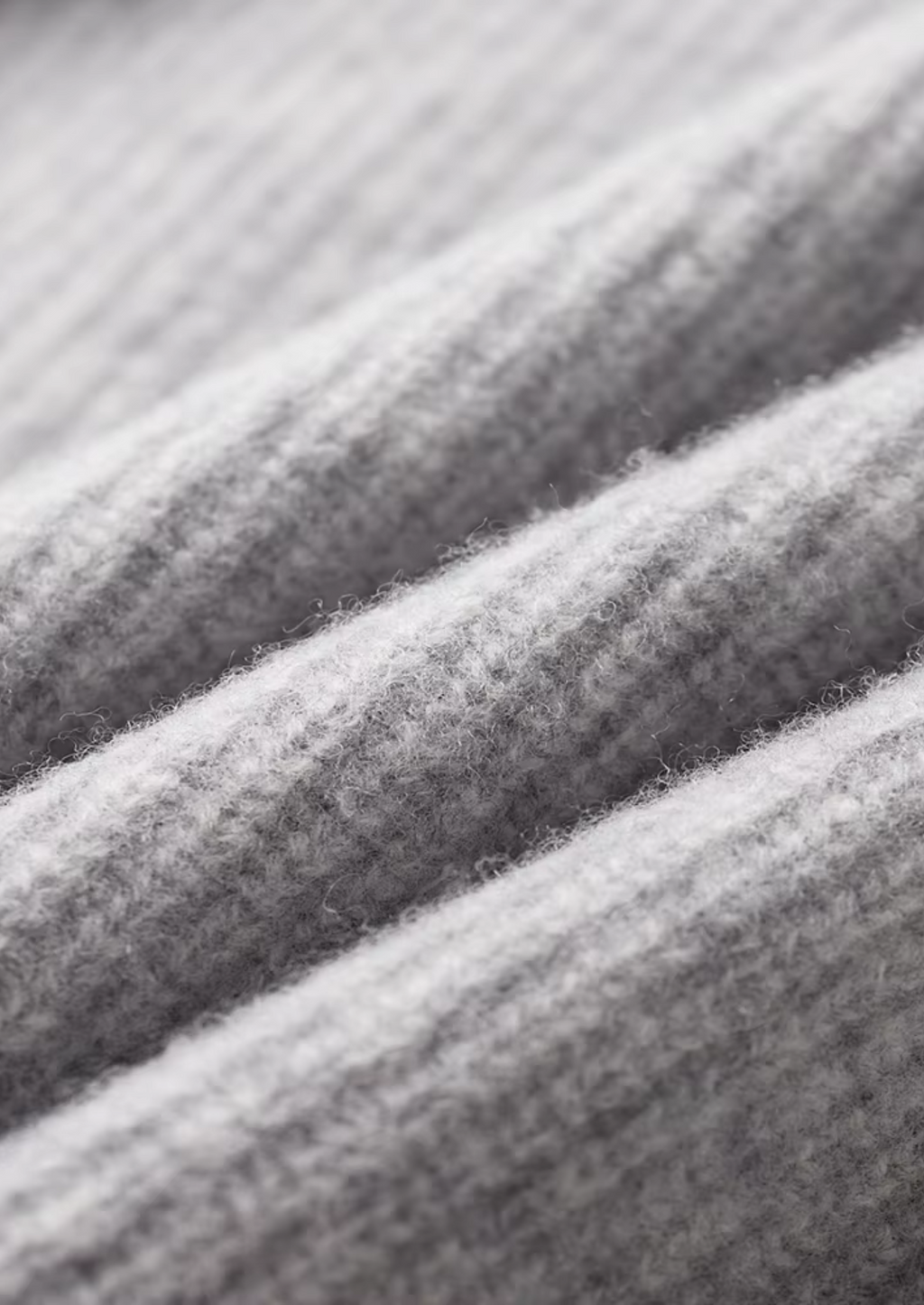 Cardigan en laine mérinos extra-fine pure à côtes tricotées