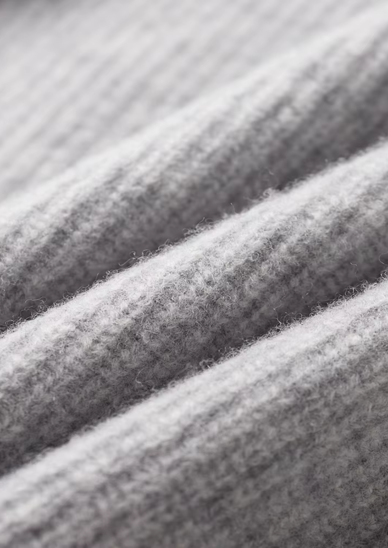 Cardigan en laine mérinos extra-fine pure à côtes tricotées